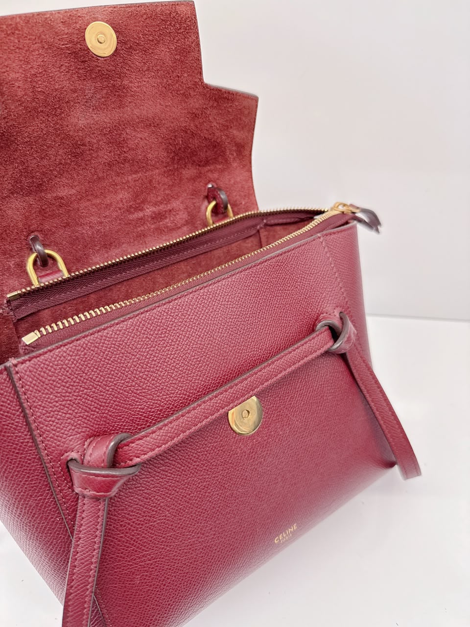 BURGUNDY LEATHER NANO BELT TOP HANDLE BAG