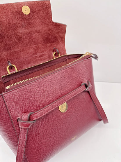 BURGUNDY LEATHER NANO BELT TOP HANDLE BAG
