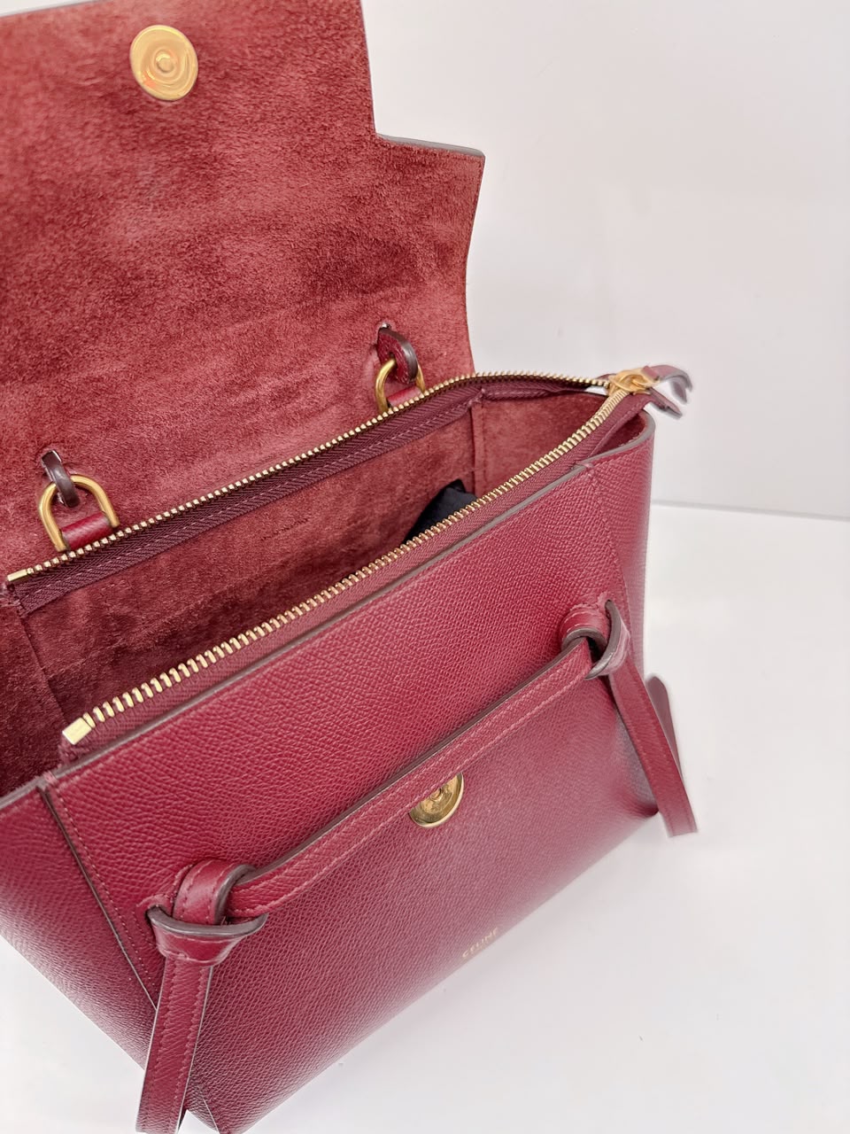 BURGUNDY LEATHER NANO BELT TOP HANDLE BAG