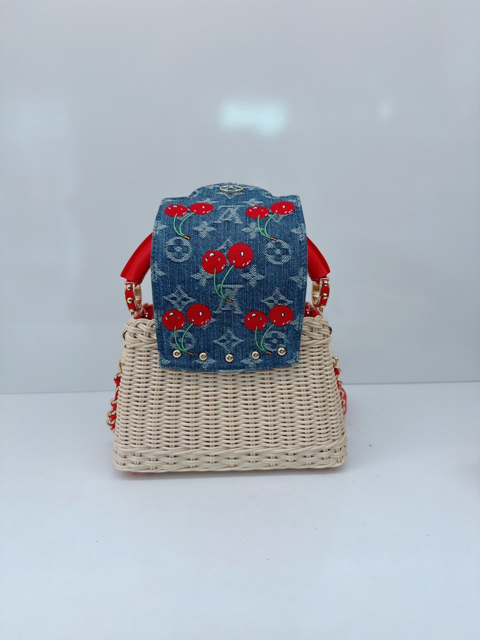 LOUIS VUITTON X TAKASHI MURAKAMI CAPUCINES  MINI RED AND BLUE MONOGRAM CHERRY DENIM AND RATTAN WICKER GOLD HARDWARE