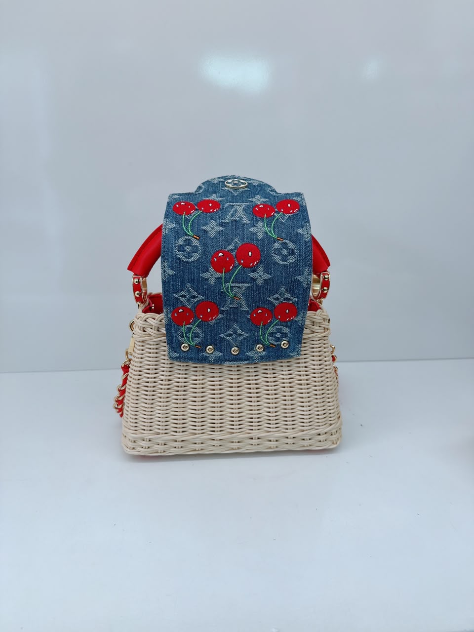 LOUIS VUITTON X TAKASHI MURAKAMI CAPUCINES  MINI RED AND BLUE MONOGRAM CHERRY DENIM AND RATTAN WICKER GOLD HARDWARE