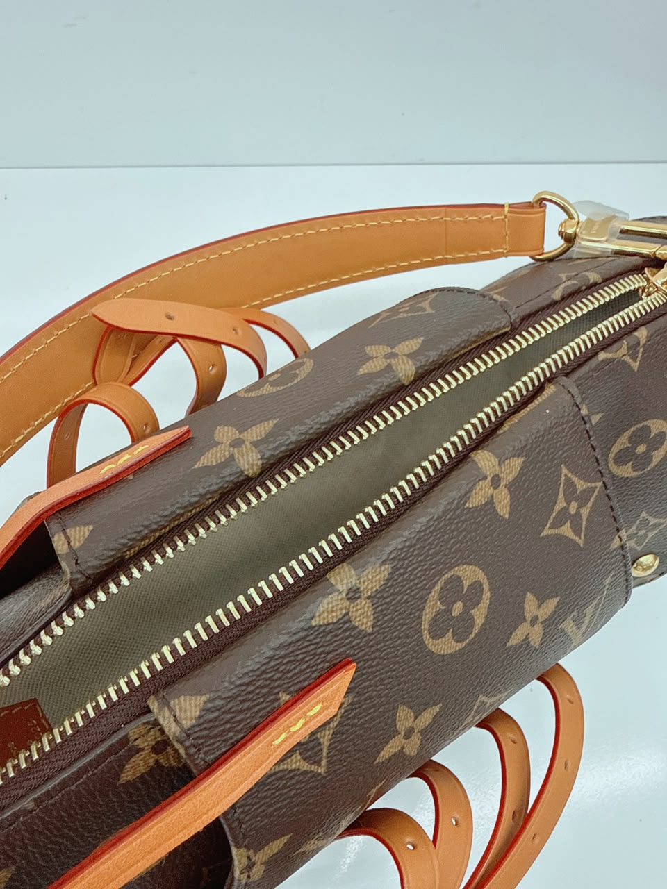 BROWN MONOGRAM CANVAS LOBSTER WEARABLE WALLET