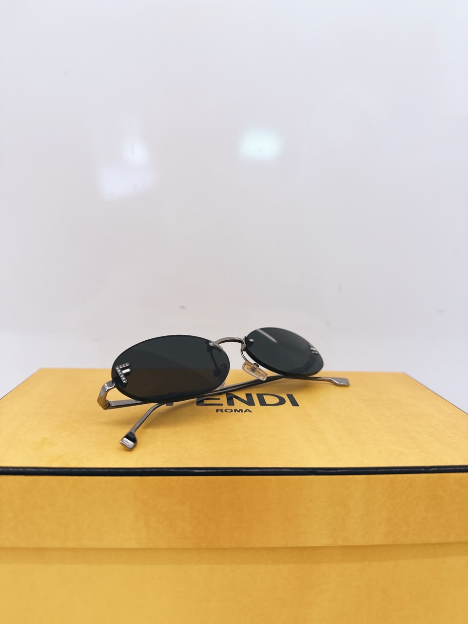 FIRST CRYSTAL BLACK OVAL SUNGLASSES