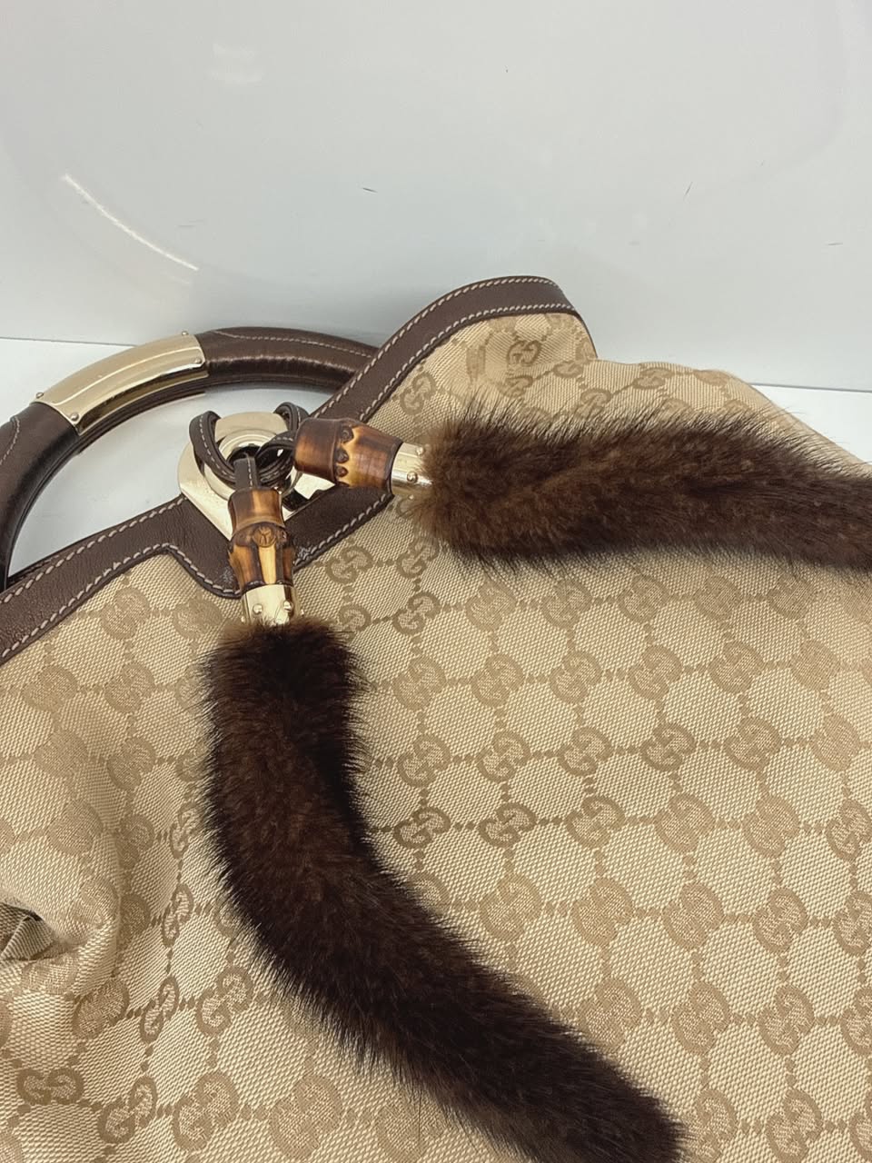 BEIGE GG CANVAS LARGE FUR TASSEL INDY HOBO BAG