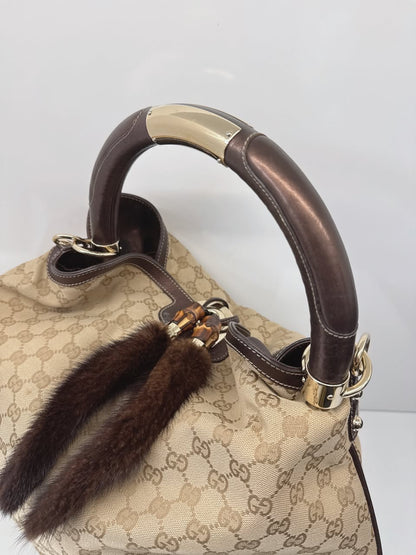 BEIGE GG CANVAS LARGE FUR TASSEL INDY HOBO BAG