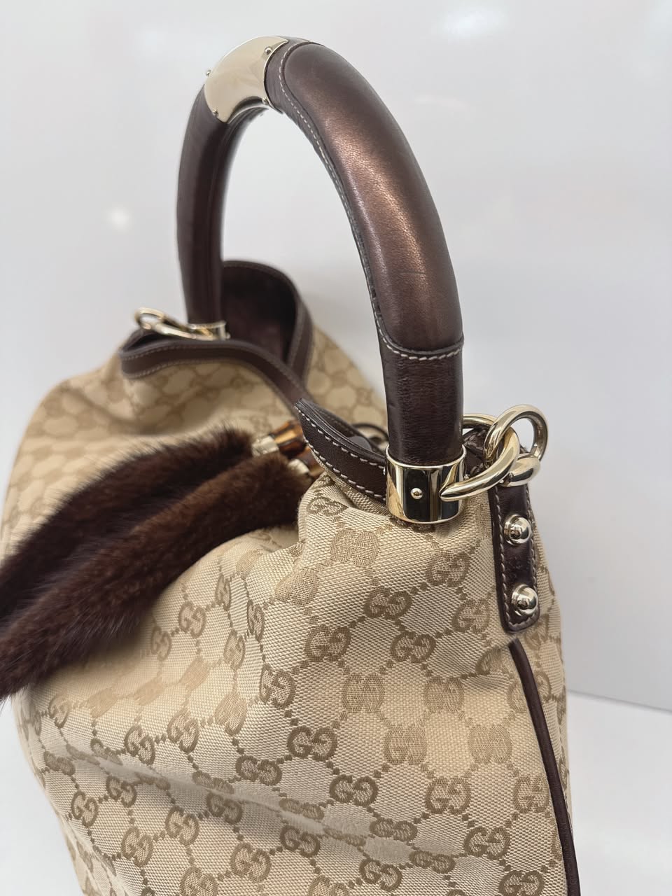 BEIGE GG CANVAS LARGE FUR TASSEL INDY HOBO BAG