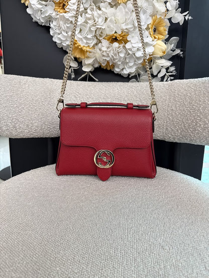 RED LEATHER INTERLOCKING TOP HANDLE SHOULDER BAG