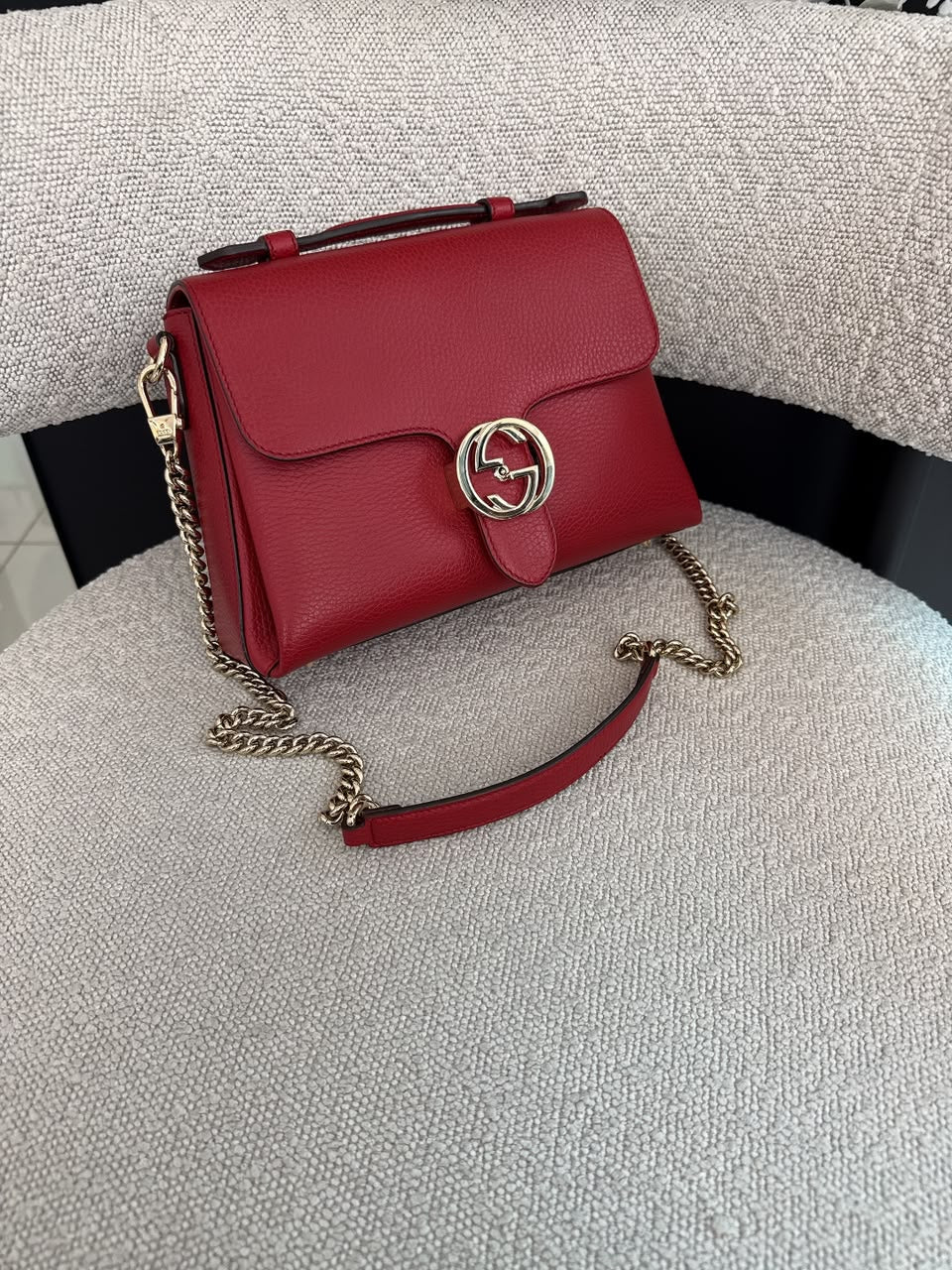 RED LEATHER INTERLOCKING TOP HANDLE SHOULDER BAG