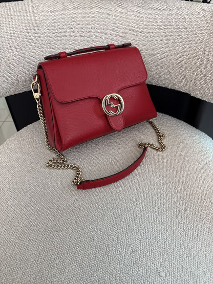 RED LEATHER INTERLOCKING TOP HANDLE SHOULDER BAG