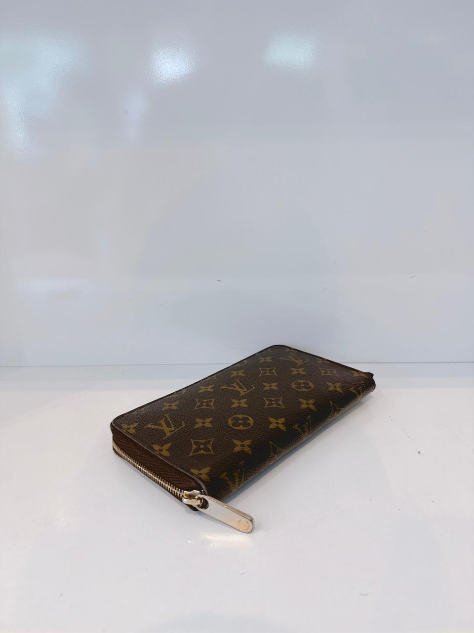 BROWN MONOGRAM CANVAS ZIPPY ORGANIZER WALLET