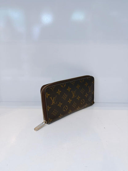 BROWN MONOGRAM CANVAS ZIPPY ORGANIZER WALLET