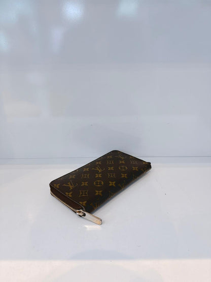 BROWN MONOGRAM CANVAS ZIPPY ORGANIZER WALLET