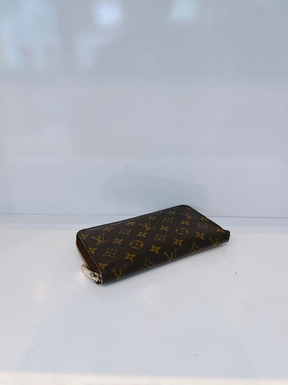 BROWN MONOGRAM CANVAS ZIPPY ORGANIZER WALLET
