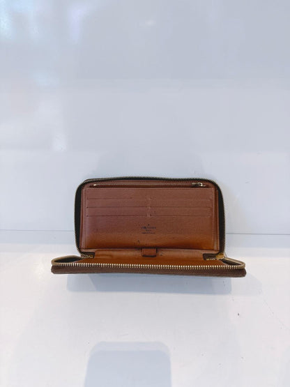 BROWN MONOGRAM CANVAS ZIPPY ORGANIZER WALLET