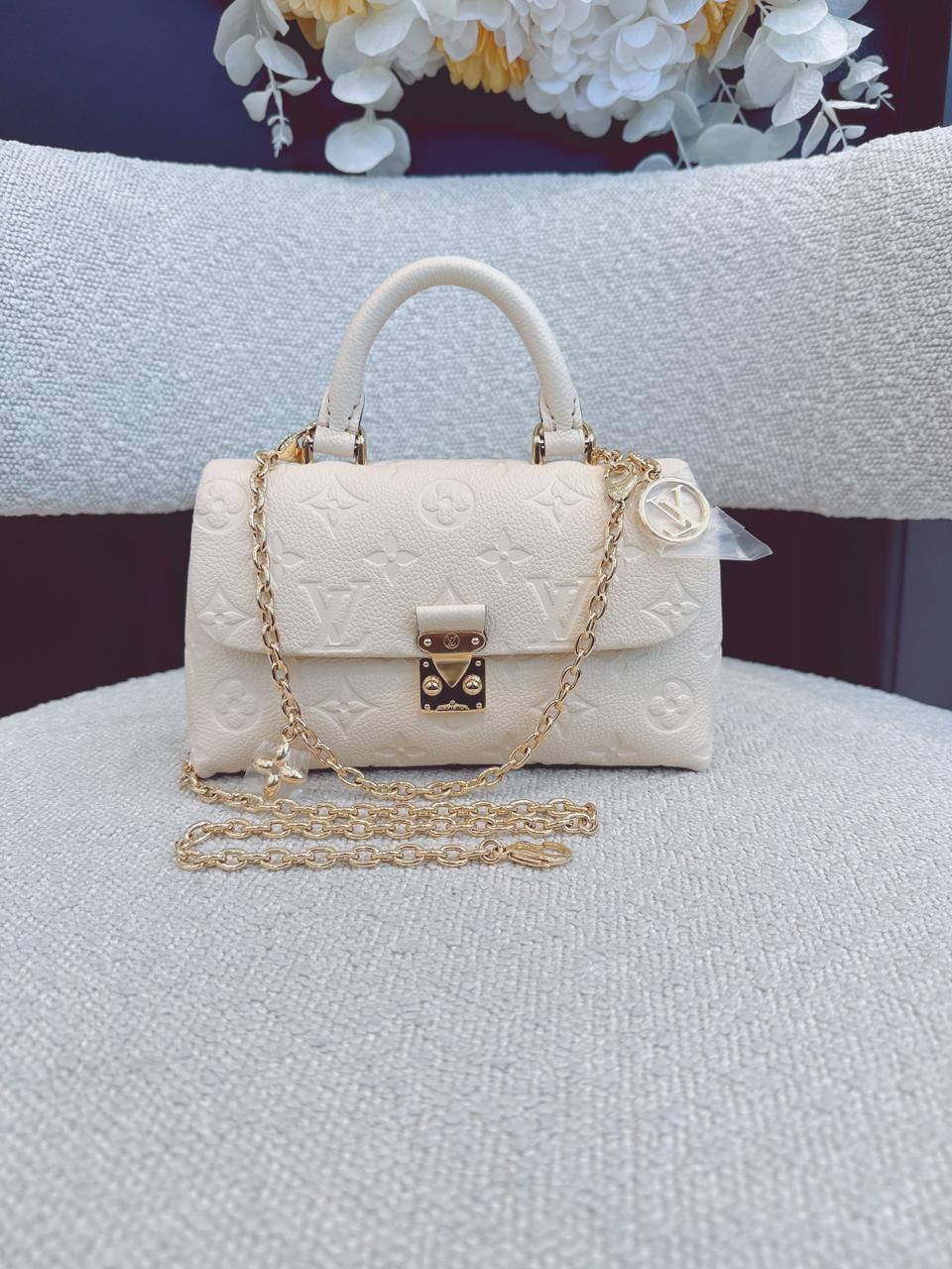 CREAM MONOGRAM EMPREINTE LEATHER NANO MADELEINE BAG