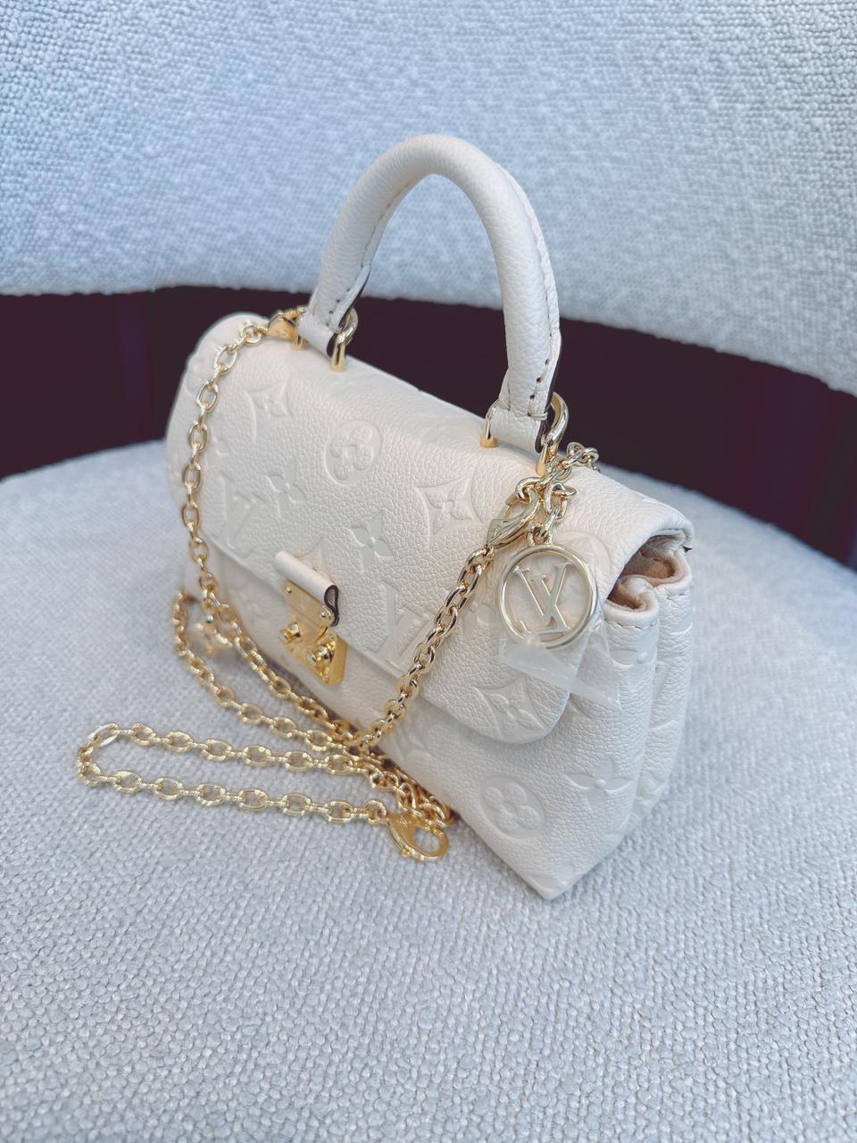 CREAM MONOGRAM EMPREINTE LEATHER NANO MADELEINE BAG
