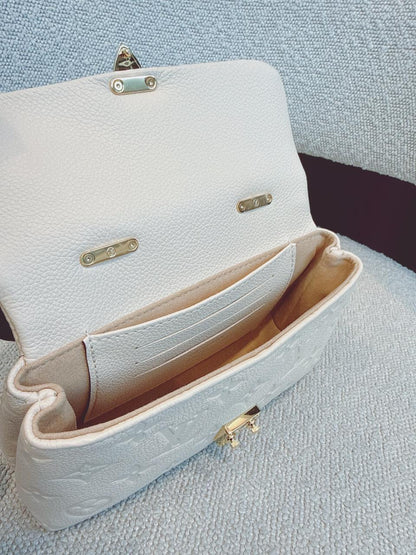CREAM MONOGRAM EMPREINTE LEATHER NANO MADELEINE BAG