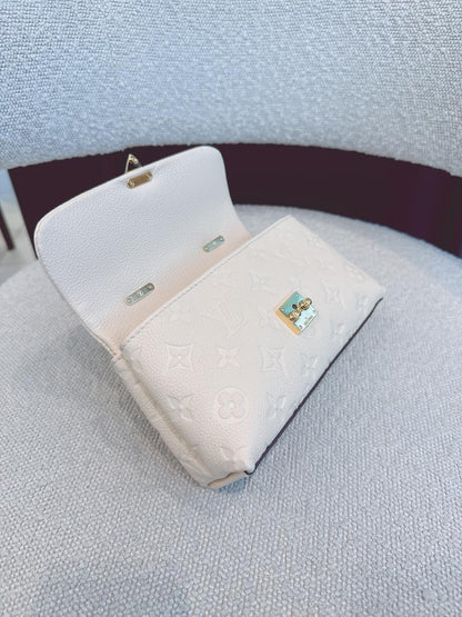 CREAM MONOGRAM EMPREINTE LEATHER NANO MADELEINE BAG