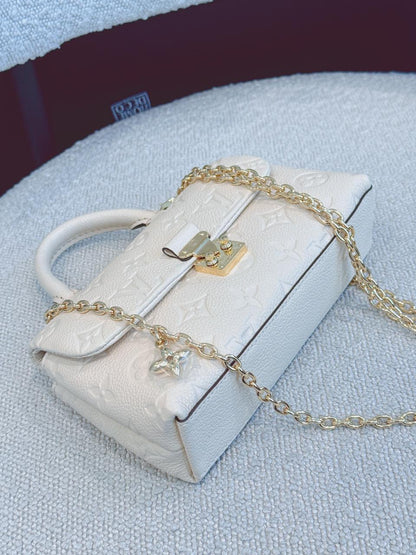 CREAM MONOGRAM EMPREINTE LEATHER NANO MADELEINE BAG