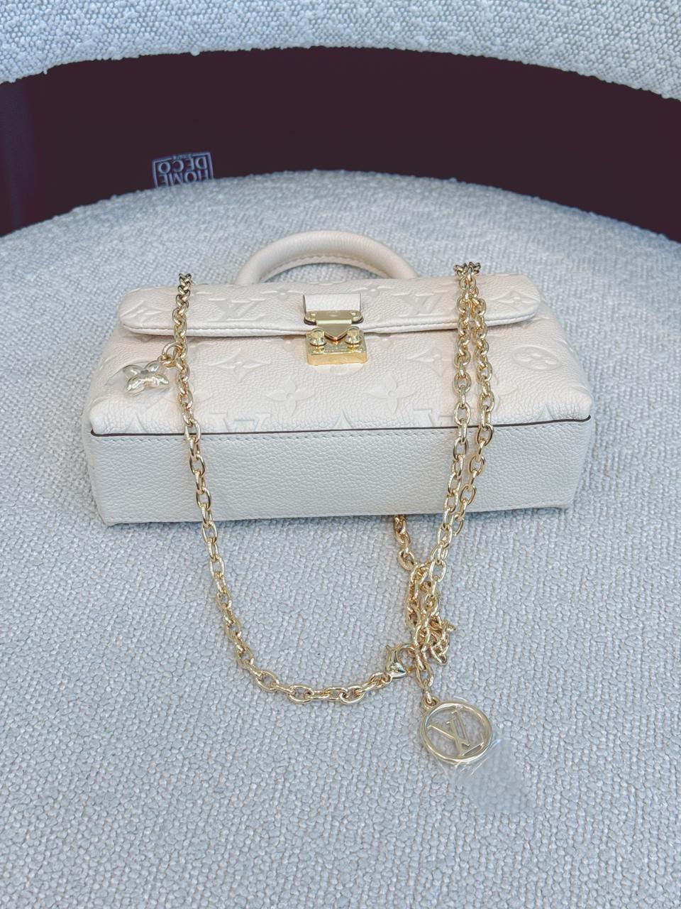 CREAM MONOGRAM EMPREINTE LEATHER NANO MADELEINE BAG