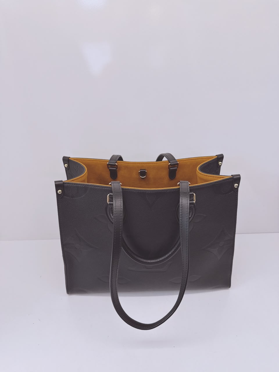 BLACK MONOGRAM EMPREINTE LEATHER ONTHEGO MM TOTE BAG
