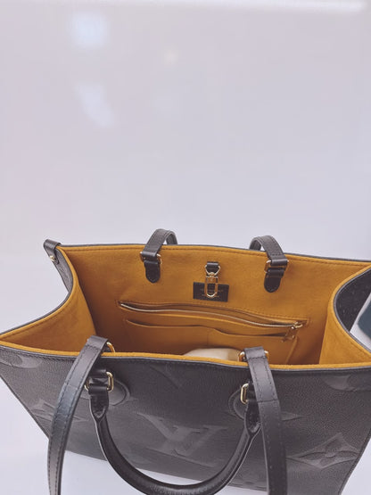 BLACK MONOGRAM EMPREINTE LEATHER ONTHEGO MM TOTE BAG