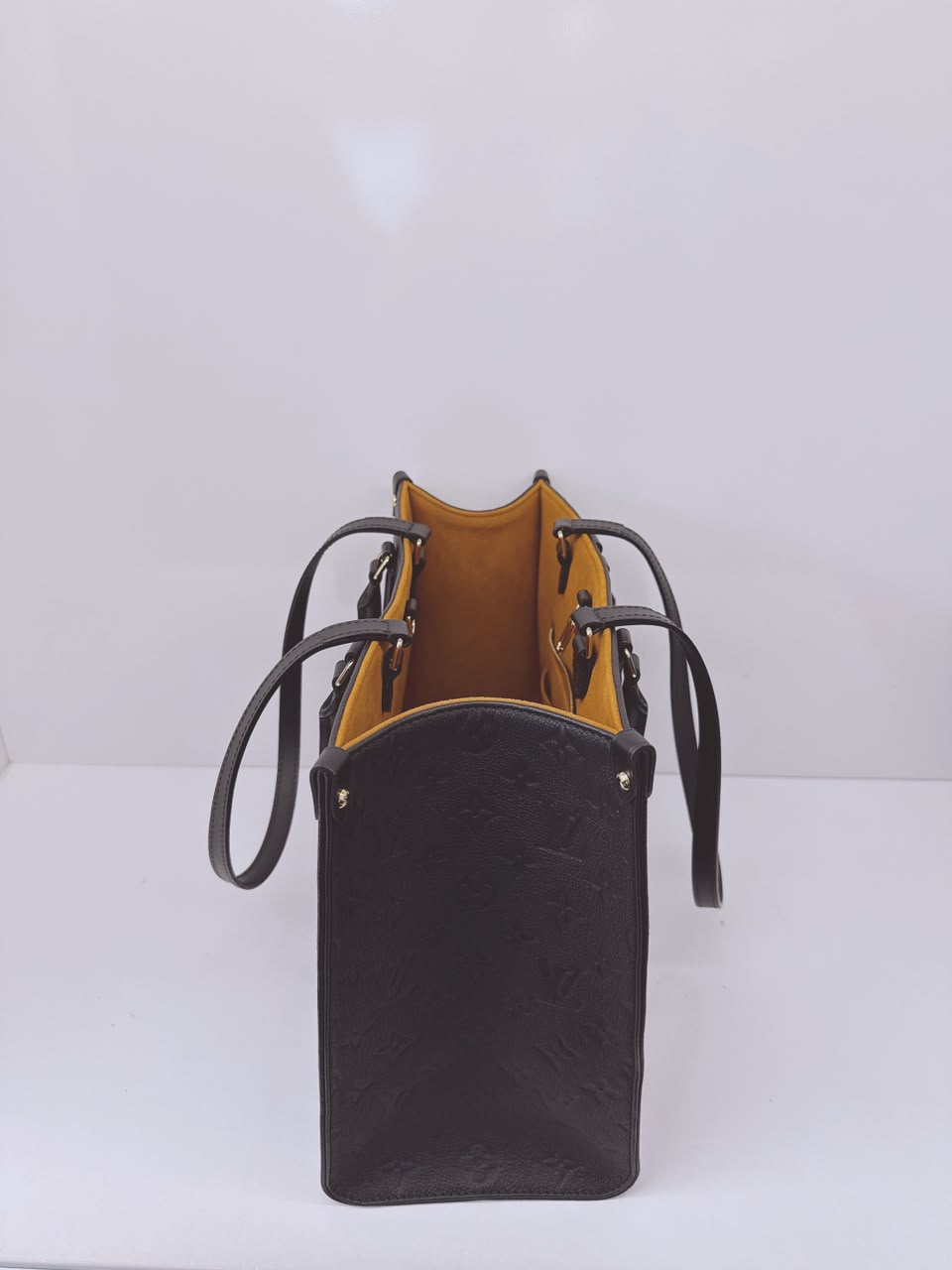 BLACK MONOGRAM EMPREINTE LEATHER ONTHEGO MM TOTE BAG