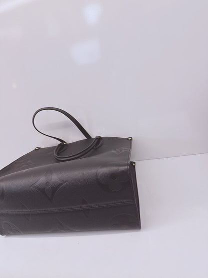 BLACK MONOGRAM EMPREINTE LEATHER ONTHEGO MM TOTE BAG