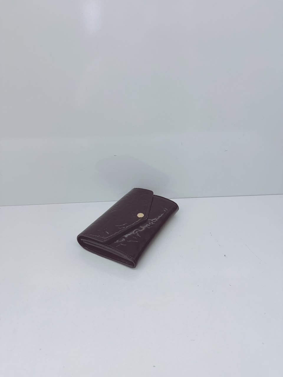 BLACK MONOGRAM VERNIS SARAH NW WALLET
