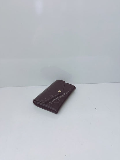 BLACK MONOGRAM VERNIS SARAH NW WALLET