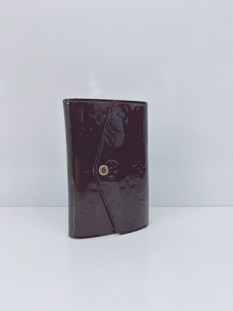 BLACK MONOGRAM VERNIS SARAH NW WALLET
