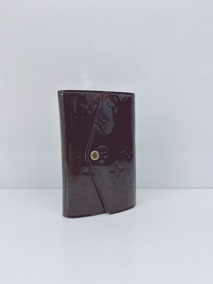 BLACK MONOGRAM VERNIS SARAH NW WALLET