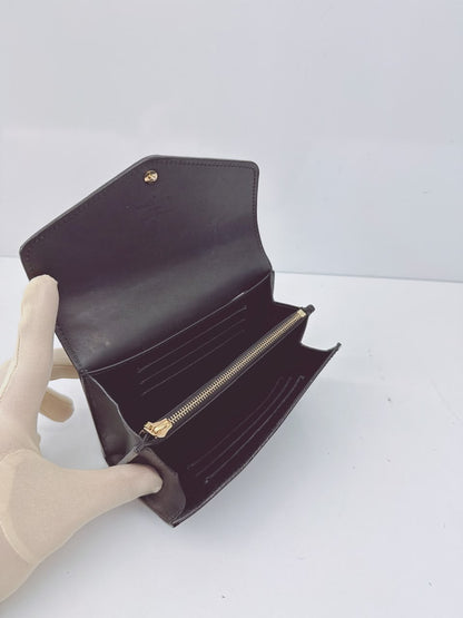 BLACK MONOGRAM VERNIS SARAH NW WALLET
