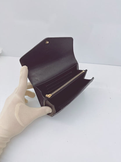 BLACK MONOGRAM VERNIS SARAH NW WALLET