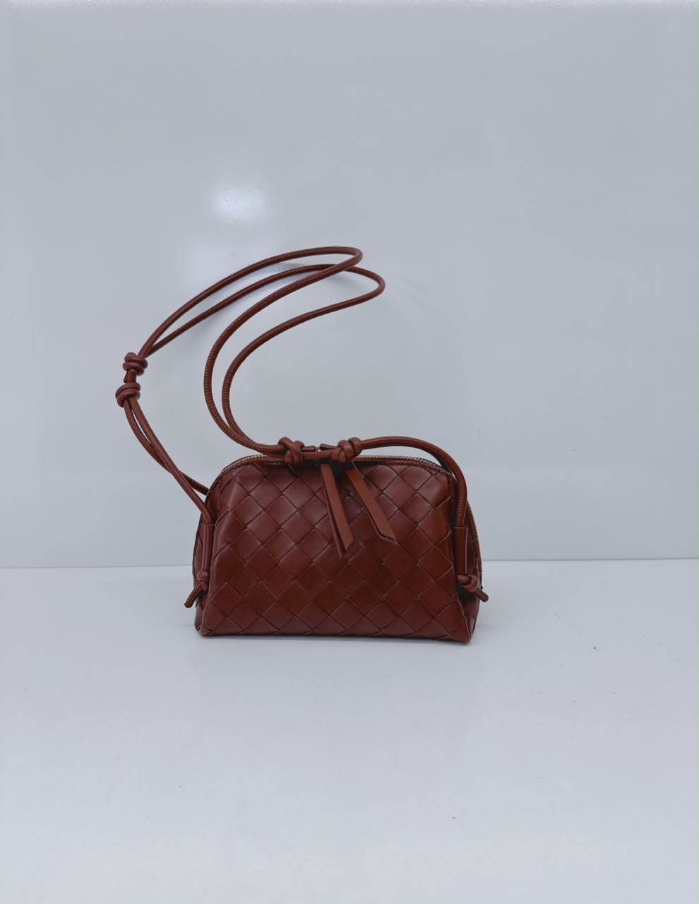 BROWN INTRECCIATO LEATHER MINI CONCERT POUCH