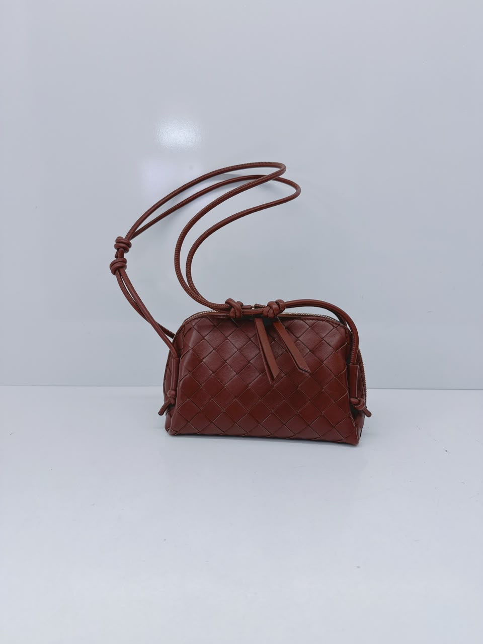 BROWN INTRECCIATO LEATHER MINI CONCERT POUCH