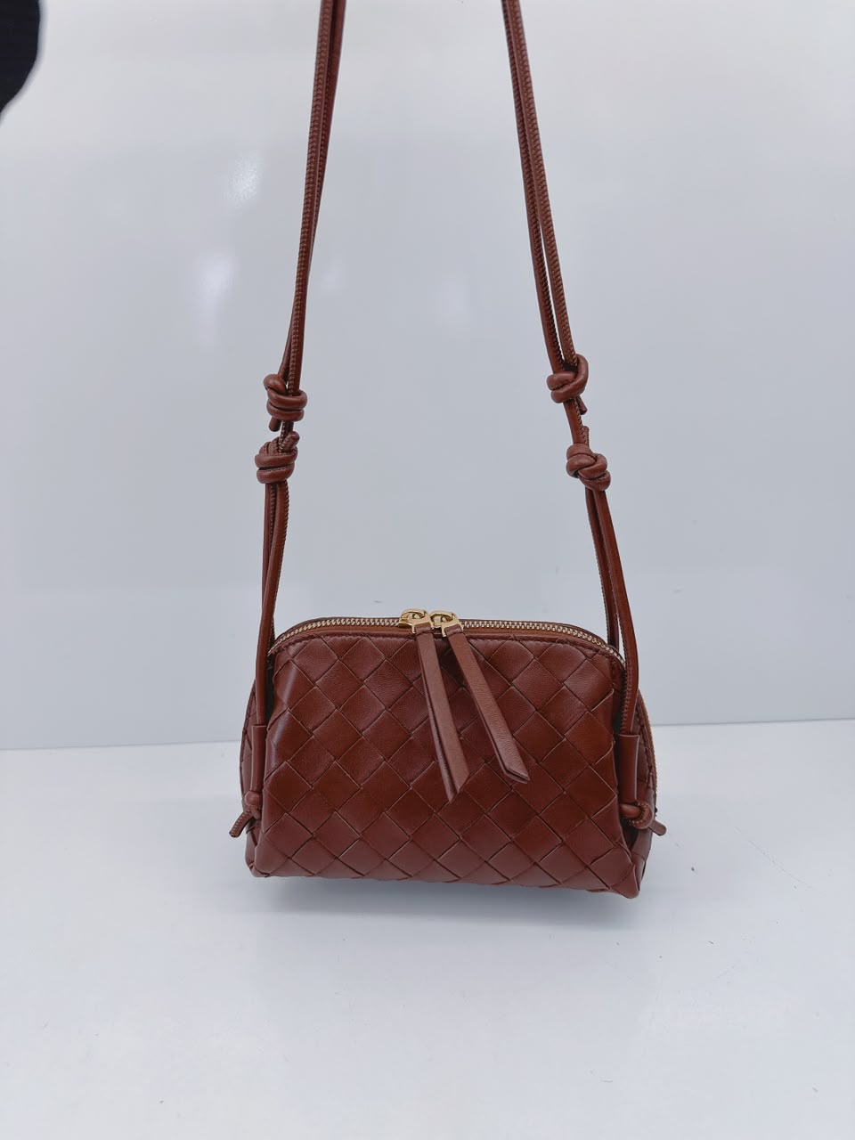 BROWN INTRECCIATO LEATHER MINI CONCERT POUCH