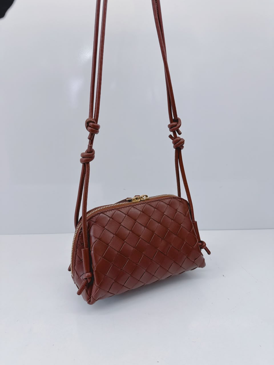 BROWN INTRECCIATO LEATHER MINI CONCERT POUCH