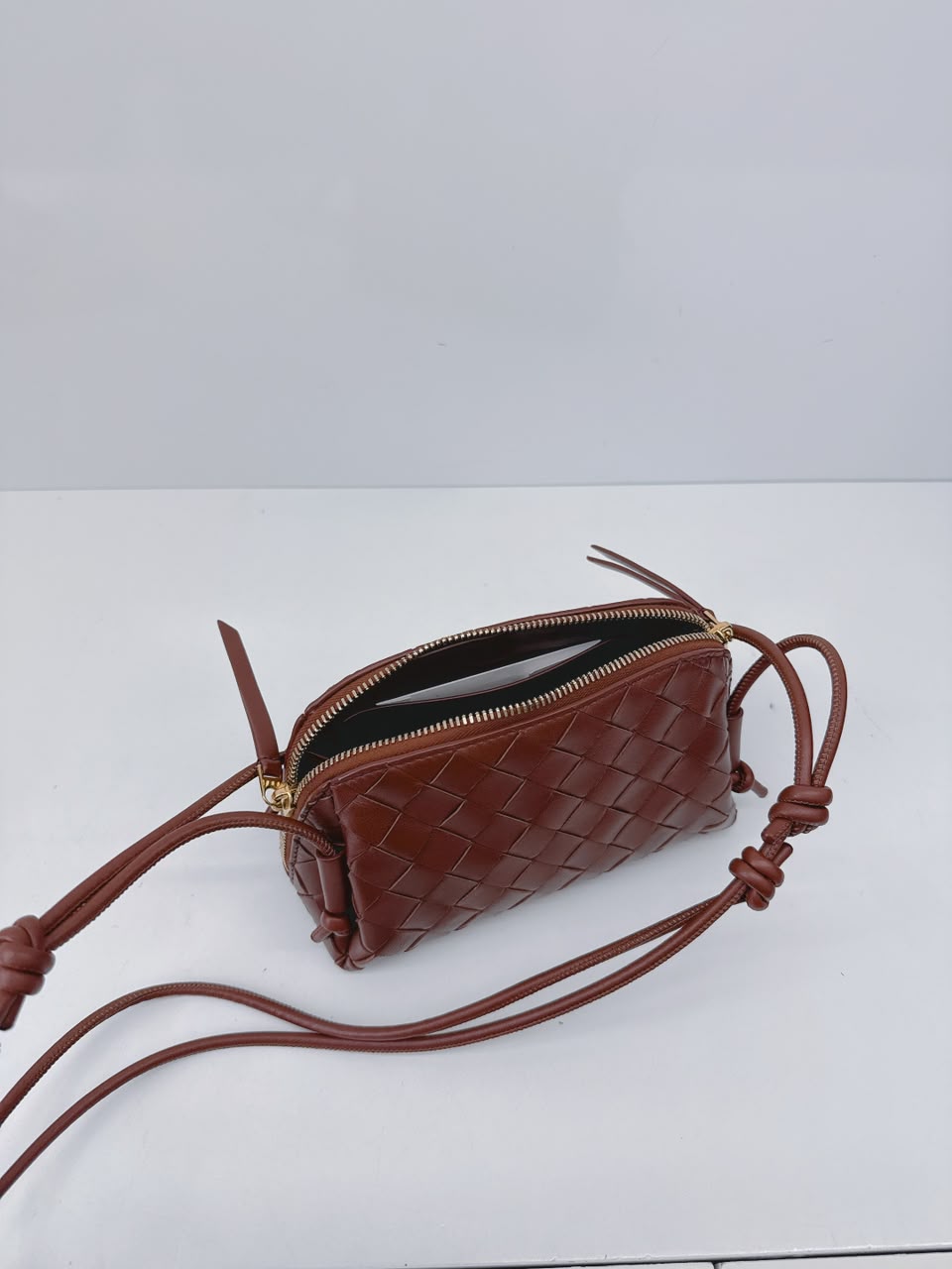 BROWN INTRECCIATO LEATHER MINI CONCERT POUCH