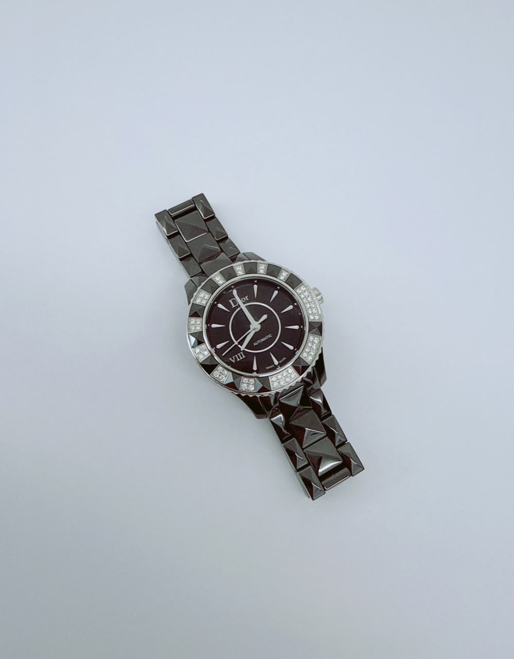 VIII PLACE VENDOME BLACK CERAMIC STAINLESS STEEL AND DIAMOND SET QUARTZ WATCH