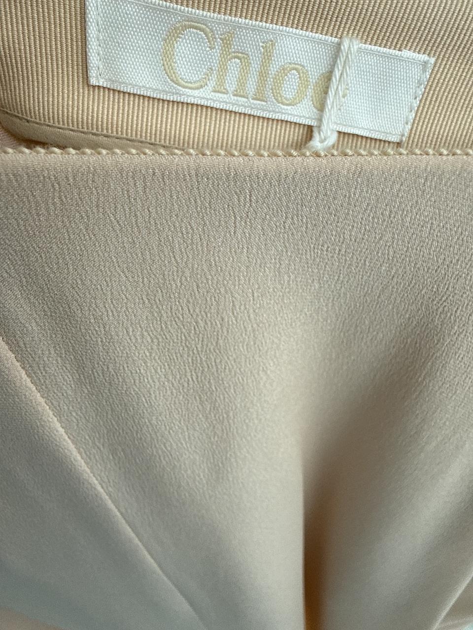 NUDE ELEGANT DROPPED FLOUNCE HEM SKIRT 38