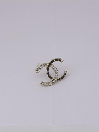 CC LOGO CRYSTAL AND LEATHER CHAIN GOLD TONE BROOCH