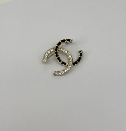 CC LOGO CRYSTAL AND LEATHER CHAIN GOLD TONE BROOCH
