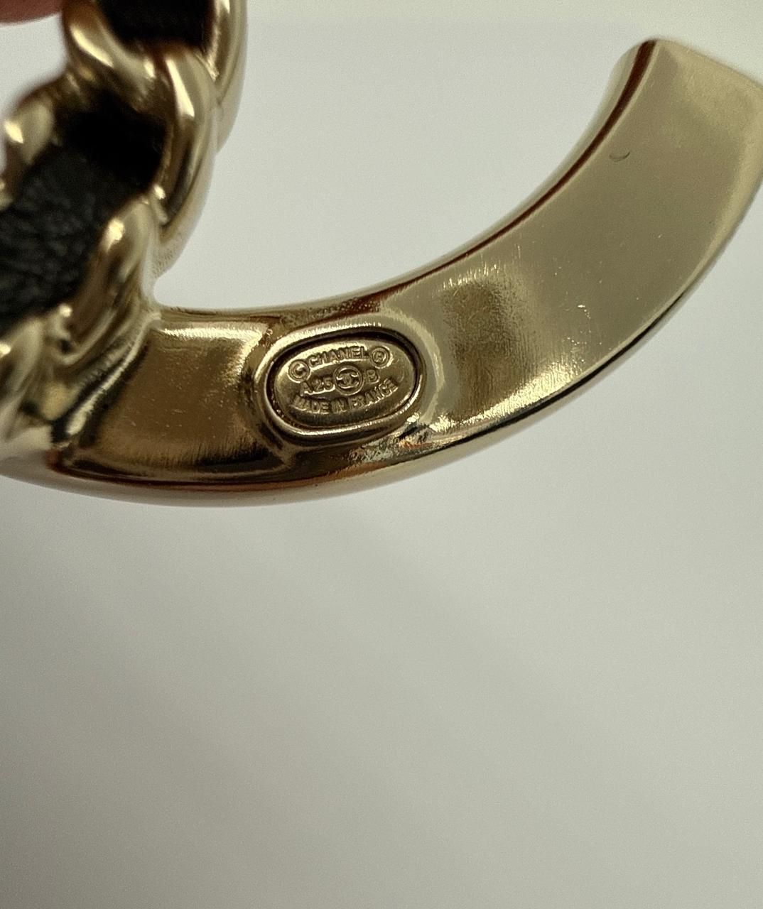 CC LOGO CRYSTAL AND LEATHER CHAIN GOLD TONE BROOCH