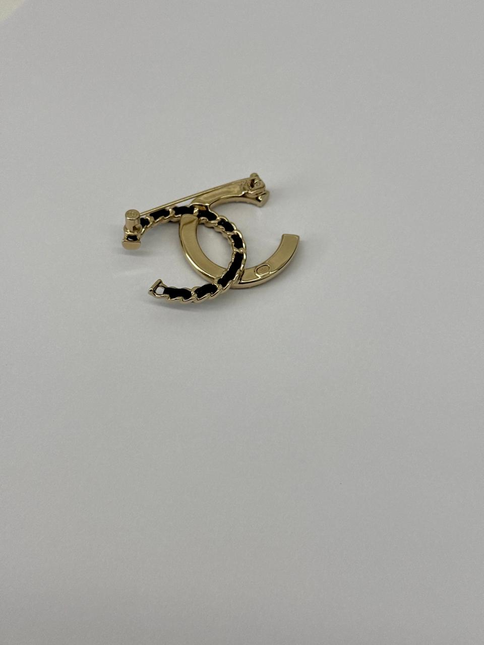 CC LOGO CRYSTAL AND LEATHER CHAIN GOLD TONE BROOCH