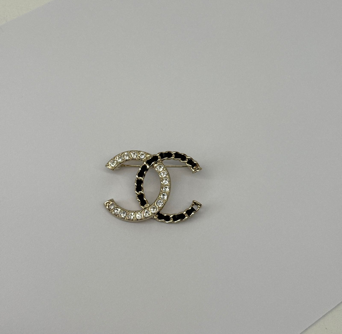 CC LOGO CRYSTAL AND LEATHER CHAIN GOLD TONE BROOCH