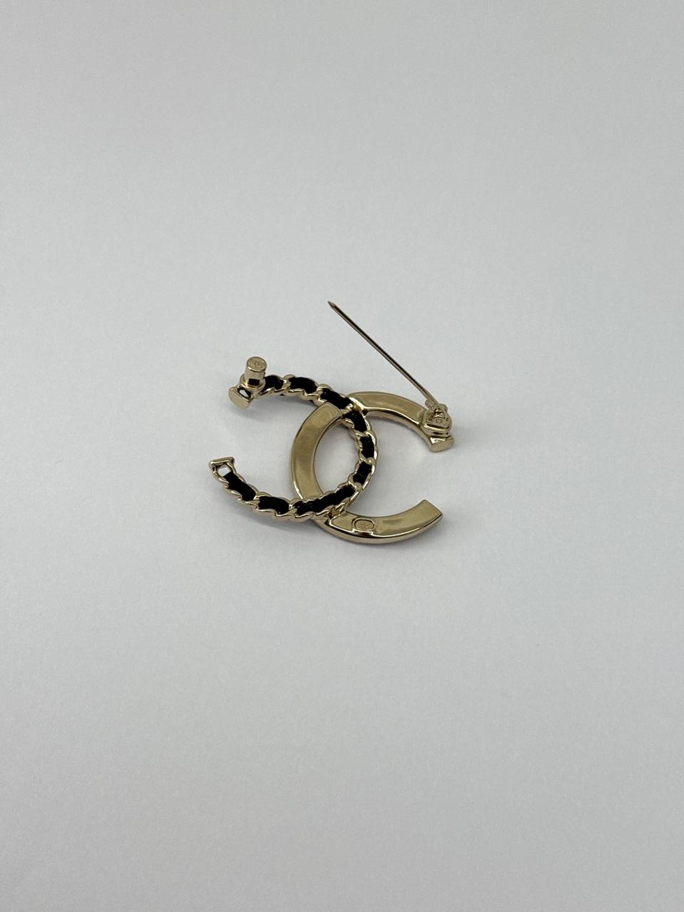CC LOGO CRYSTAL AND LEATHER CHAIN GOLD TONE BROOCH