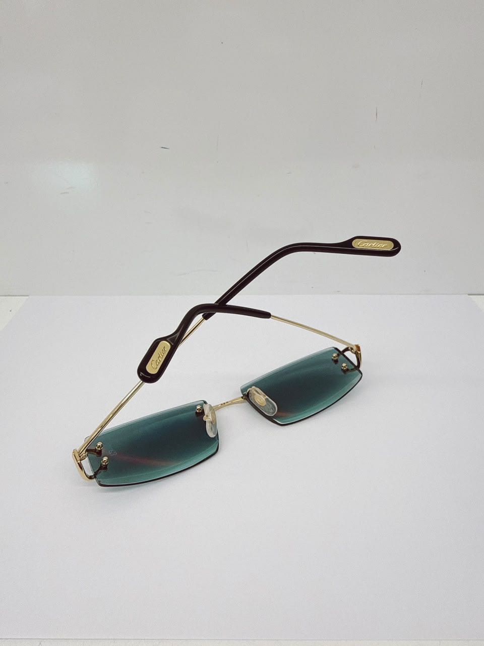 SIGNATURE C DE CARTIER RIMLESS RECTANGLE SUNGLASSES