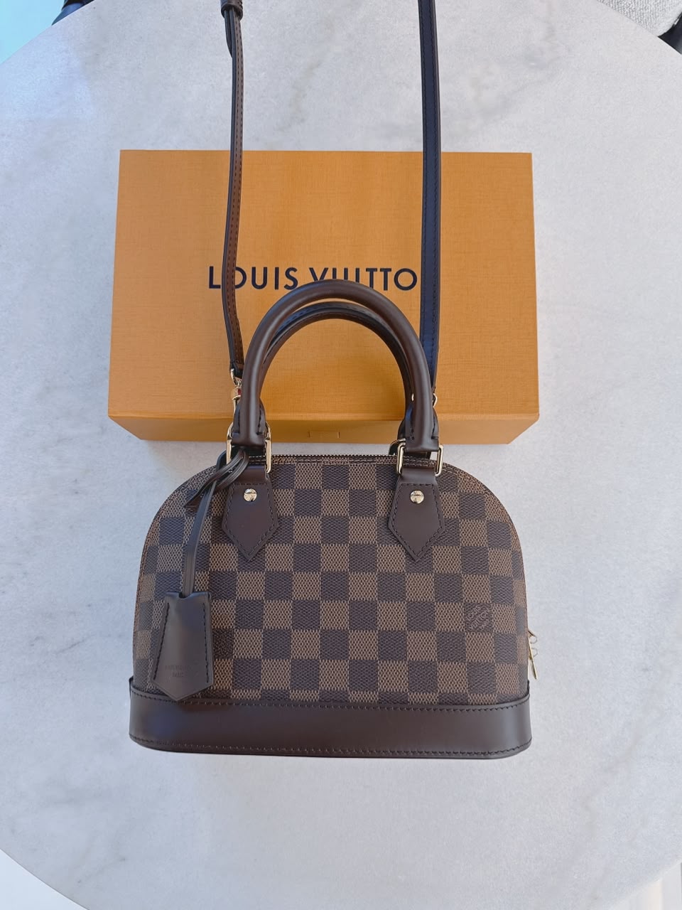 DAMIER EBENE COATED CANVAS ALMA BB HANDBAG