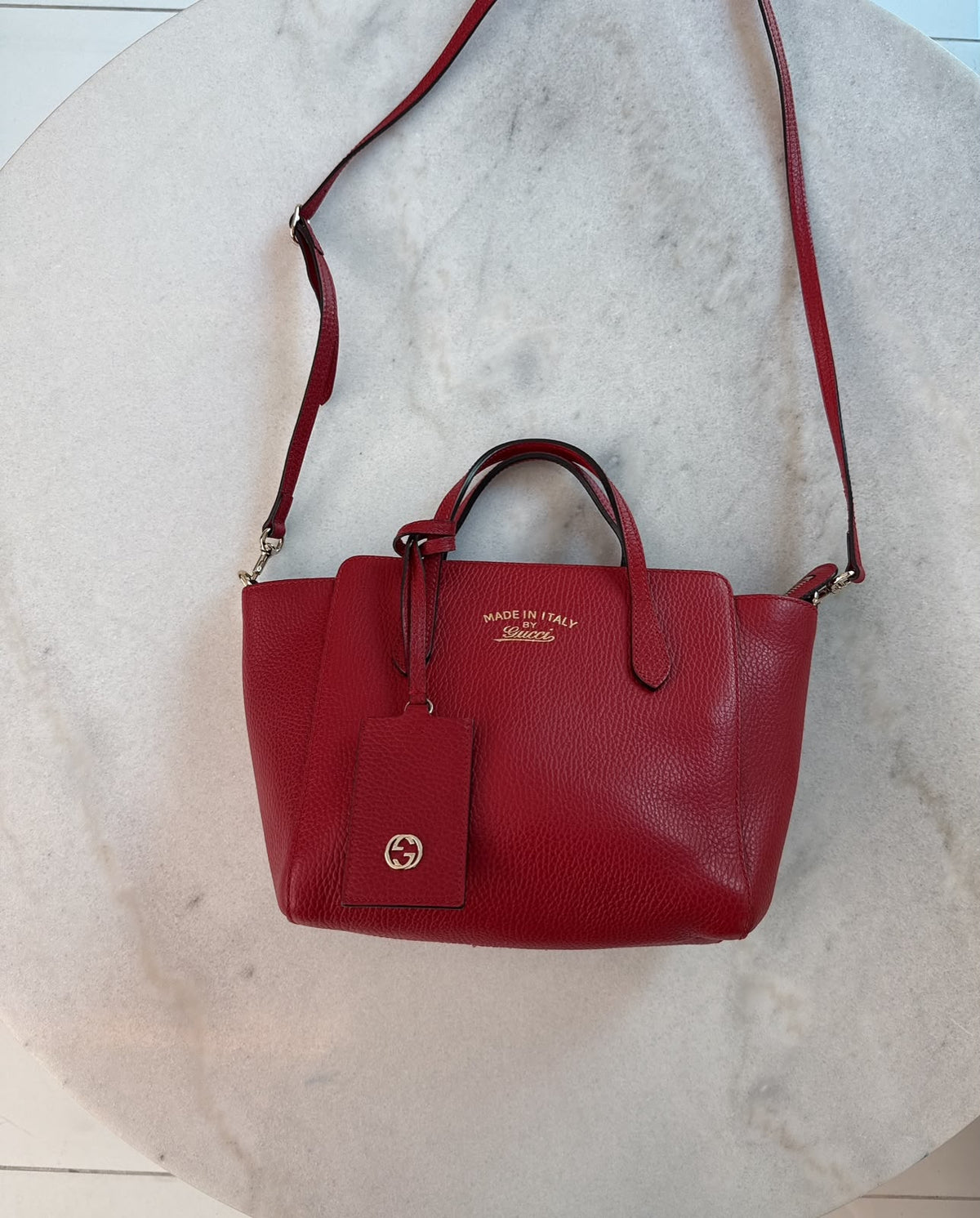 RED LEATHER MINI SWING TOTE BAG